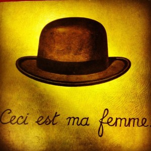 The cover image from Oliver Sack's 'The Man Who Mistook his Wife for a Hat'. The image is a nod to Magritte's famous painting The Treachery of Images (1929).